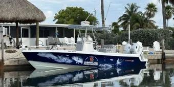A charter boat docked and ready for a trip